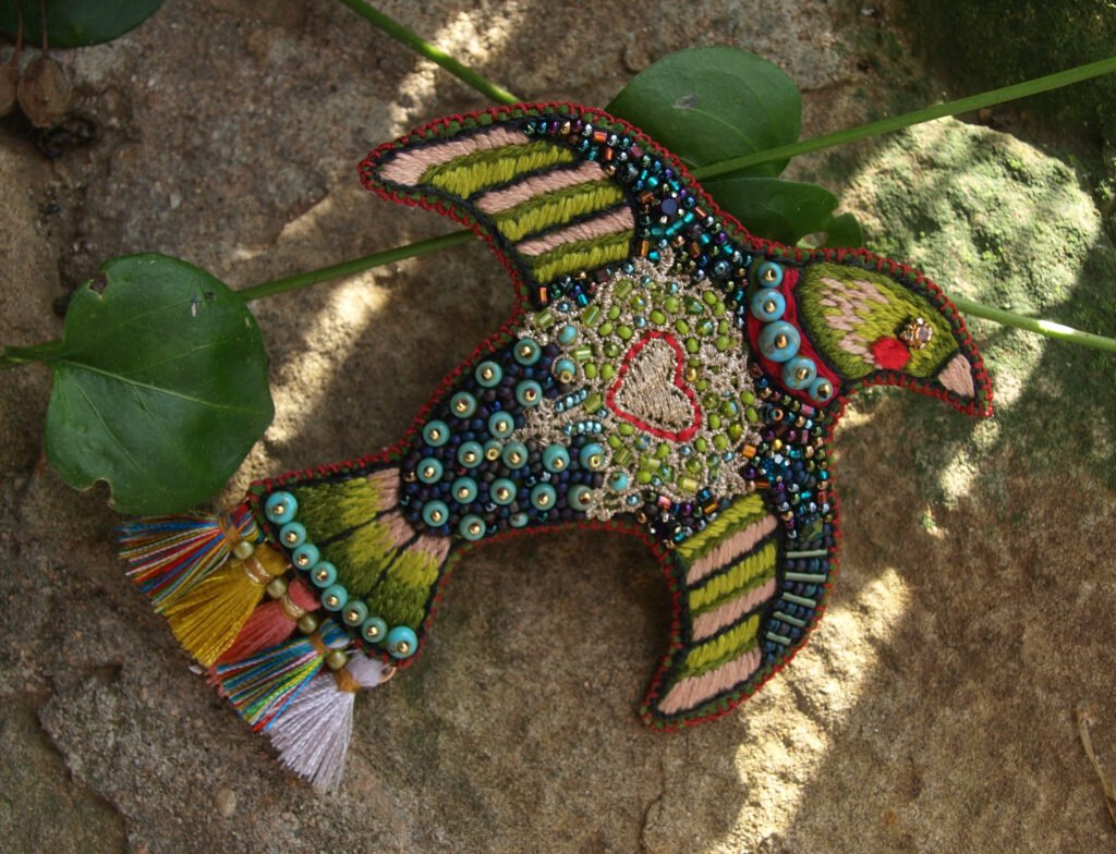 Broche 21 (adoptée)